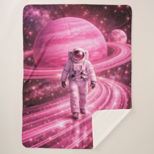 Couverture Sherpa Astronaute marchant sur des anneaux roses