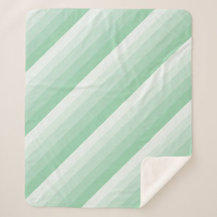 Couverture Sherpa Bandes diagonales ombres dans les tons vert jade