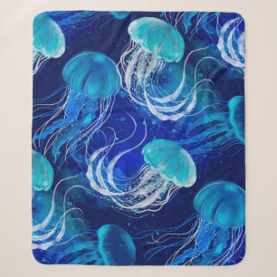 Couverture Sherpa Beaucoup de méduses bleues nageant sous l'eau. Sea