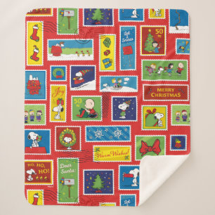 Couverture Sherpa cacahuètes Motif des timbres de Noël