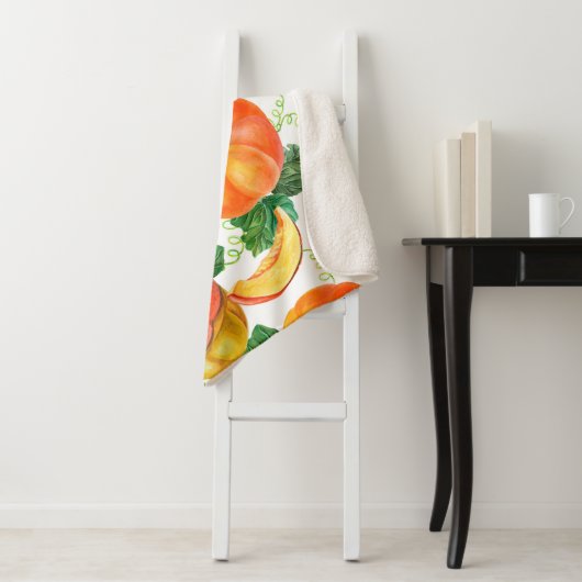 Couverture Sherpa Citrouille orange sur arrière - plan blanc. Patte  (En situation)