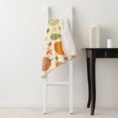 Couverture Sherpa Citrouille vert et orange, motif sans soudure. (En situation)