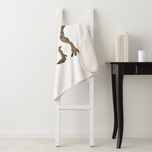 Couverture Sherpa Dilophosaurus dessin animé (En situation)