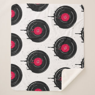 Couverture Sherpa disques vinyliques fondus, motif artistique.