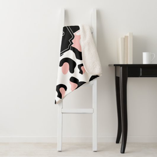 Couverture Sherpa Empreinte de léopard rose (En situation)