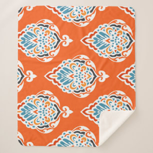 Couverture Sherpa Festive damassé vintage motif, design élégant.