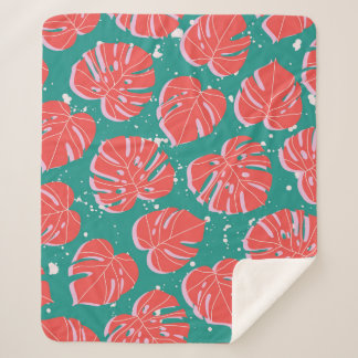 Couverture Sherpa Feuilles de monstère rouge sur motif vert transpar