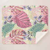 Couverture Sherpa Feuilles tropicaux roses et verts, fleurs bleues. (Devant (Horizontal))