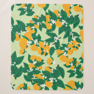 Couverture Sherpa Fruit orange : motif vintage vert.