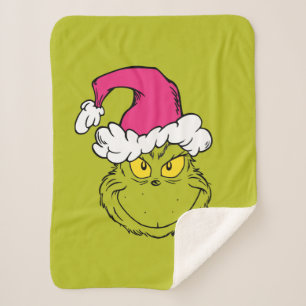 Couverture Sherpa Grinch avec un chapeau de Père Noël rose