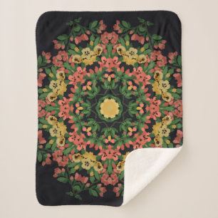 Couverture Sherpa Mandala floral clair aux fleurs rouges et jaunes.