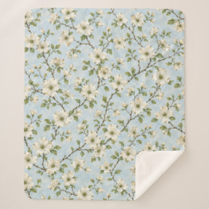 Couverture Sherpa Motif de fleur de cornouiller du Sud sur fond bleu