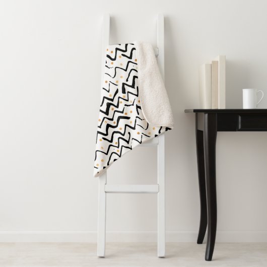 Couverture Sherpa Motif noir de courses et de points de brosse (En situation)