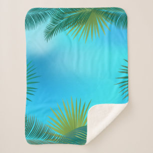Couverture Sherpa Palmettes tropicales sur le paysage de ciel bleu