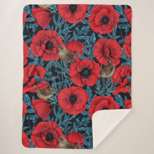 Couverture Sherpa Pavot rouge et brunes, feuilles bleus sur noir