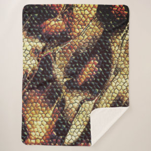 Couverture Sherpa Peau de reptile aux taches jaunâtres et foncées ?