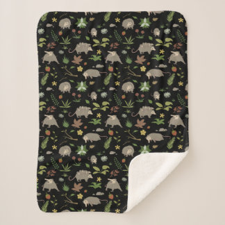 Couverture Sherpa Possum dans un champ de Berry en noir