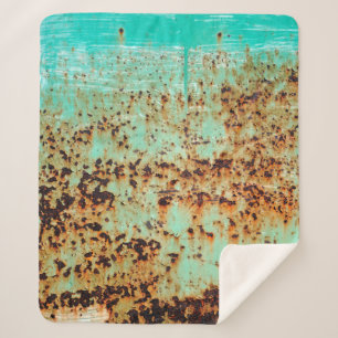 Couverture Sherpa surface en acier. Un vieux vert patiné