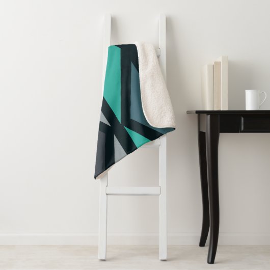 Couverture Sherpa Triangles d'art géométrique rétro Turquoise noir (En situation)