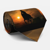 Cowboy équitation dans la cravate couché de soleil (Roulé)