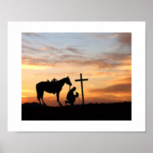 Cowboy gebedsilhouet met zonsondergang Poster