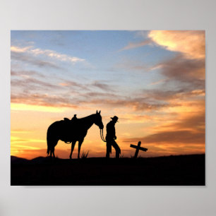 Cowboy gebedsilhouet met zonsondergang Poster