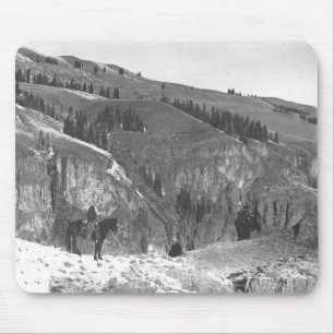 Cowboy gescheiden van zijn kudde. muismat