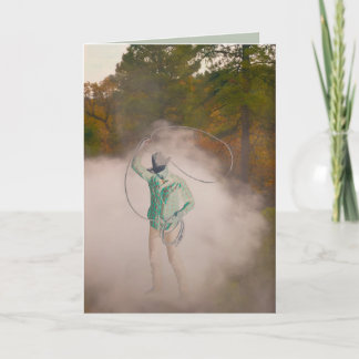 Cowboy man roping stirring up dust out west kaart