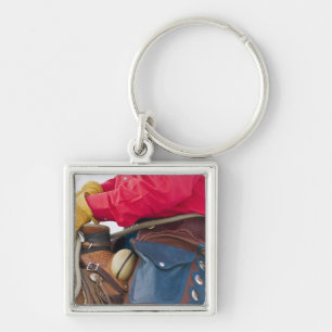 Cowboy op paard met leren chaps sleutelhanger