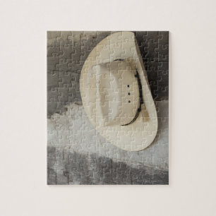 Cowboy-pet aan de wand van de logcabine legpuzzel