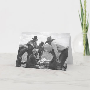 Cowboys die een tijdschrift kijken kaart