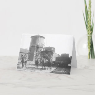 Cowboys die op paarden voor een trein stellen kaart