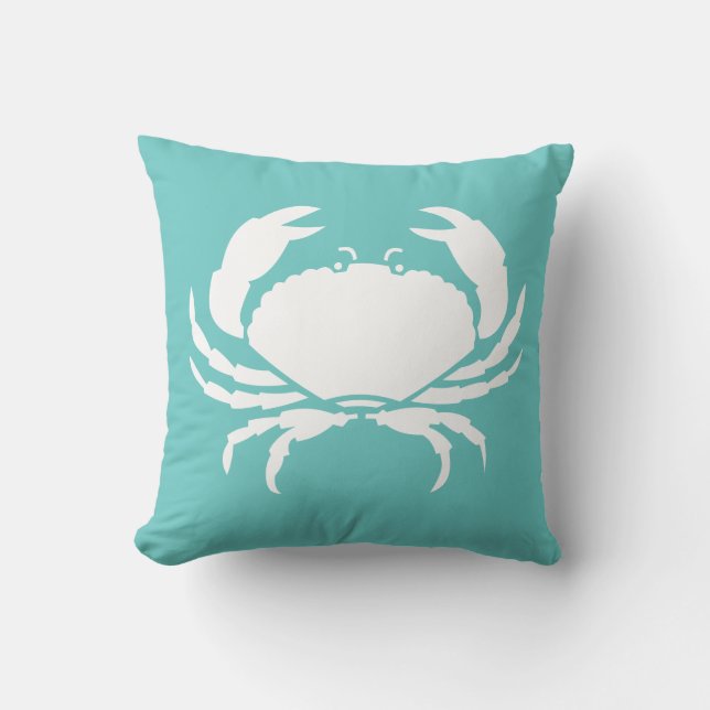 CRAB WHITE op blauwgroen blauwe kussen (Voorkant)