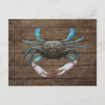 Crabe bleu sur carte postale en bois