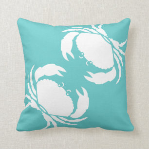 CRABS BLANC sur coussin bleu turquoise