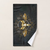 Crâne d'oiseaux dorés sur arrière - plan noir (Serviette à main)