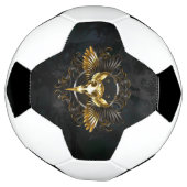 Crâne d'oiseaux dorés sur arrière - plan noir (Tourné)