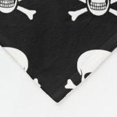 Crâne et couverture d'os croisés avec le texte (Coin)