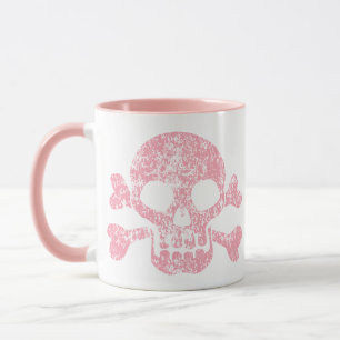 Crâne rose usé et mug crossbones