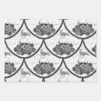 Crânes et corbeaux enveloppant des feuilles de pap