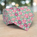 Cravate 70s Granny Square Crochet Necktie<br><div class="desc">This unique necktie features a vibrant 70s-inspired design, crafted with intricate granny square crochet. It's a bold and stylish statement piece, perfect for adding a touch of retro charm and handmade artistry to any outfit. The warm, inviting colors and textured pattern make it a conversation starter, suitable for both casual...</div>