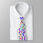 Cravate A tie with a vibrant, colorful paisley pattern (Attaché)
