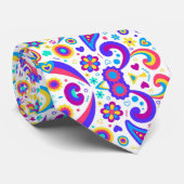 Cravate A tie with a vibrant, colorful paisley pattern (Roulé)