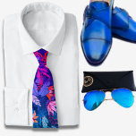 Cravate Aquarelle Hawaï motif bleu<br><div class="desc">La cravate pour hommes Blue Hawaiian print présente un éventail captivant de feuilles tropicaux colorés dans son design. L'illustration vibrante de la cravate saisit la beauté luxuriante et exotique des îles Hawaiiennes, apportant un éclat de flair tropical à toute tenue. Les feuilles représentés sur la cravate sont de couleurs vives...</div>