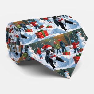 Cravate Chat Tuxedo Courant dans la Neige avec un Chapeau 