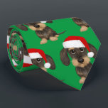 Cravate Chien de Noël à poils durs Dachshund Père Noël Tec<br><div class="desc">Ajoutez un peu de gaieté de vacances à votre garde-robe avec ce cravate vert festif avec un imprimé en continu d'un adorable dachshund à poils durs portant un chapeau de Père Noël. Que vous soyez à la fête de Noël au bureau ou à un événement de vacances plus formel, ce...</div>