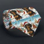 Cravate Dachshund Winter Wonderland Christmas Joy<br><div class="desc">Ce design festif reflète l'esprit joyeux de la période des fêtes, avec un adorable petit portant un chapeau de Père Noël. Le chien est niché dans un pays des merveilles hivernales, avec un bonhomme de neige, un sapin de Noël décoré et des cadeaux joliment emballés. Les flocons de neige tombent...</div>