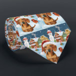 Cravate Dachshund Winter Wonderland Christmas Joy<br><div class="desc">Ce design festif reflète l'esprit joyeux de la période des fêtes, avec un adorable petit portant un chapeau de Père Noël. Le chien est niché dans un pays des merveilles hivernales, avec un bonhomme de neige, un sapin de Noël décoré et des cadeaux joliment emballés. Les flocons de neige tombent...</div>
