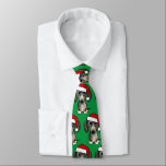 Cravate Dappy Dachshund Père Noël Wiener Chien Noël<br><div class="desc">Ajoutez un peu de gaieté de vacances à votre garde-robe avec ce cravate vert festif avec un imprimé en continu d'un adorable dachshund dapple portant un chapeau de Père Noël. Que vous soyez à la fête de Noël au bureau ou à un événement de vacances plus formel, ce cravate unique...</div>