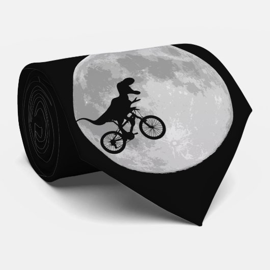 Cravate Dinosaure sur un vélo dans le ciel avec la lune (Roulé)